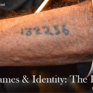 Man showing his concentration camp tattoo of a number on arm