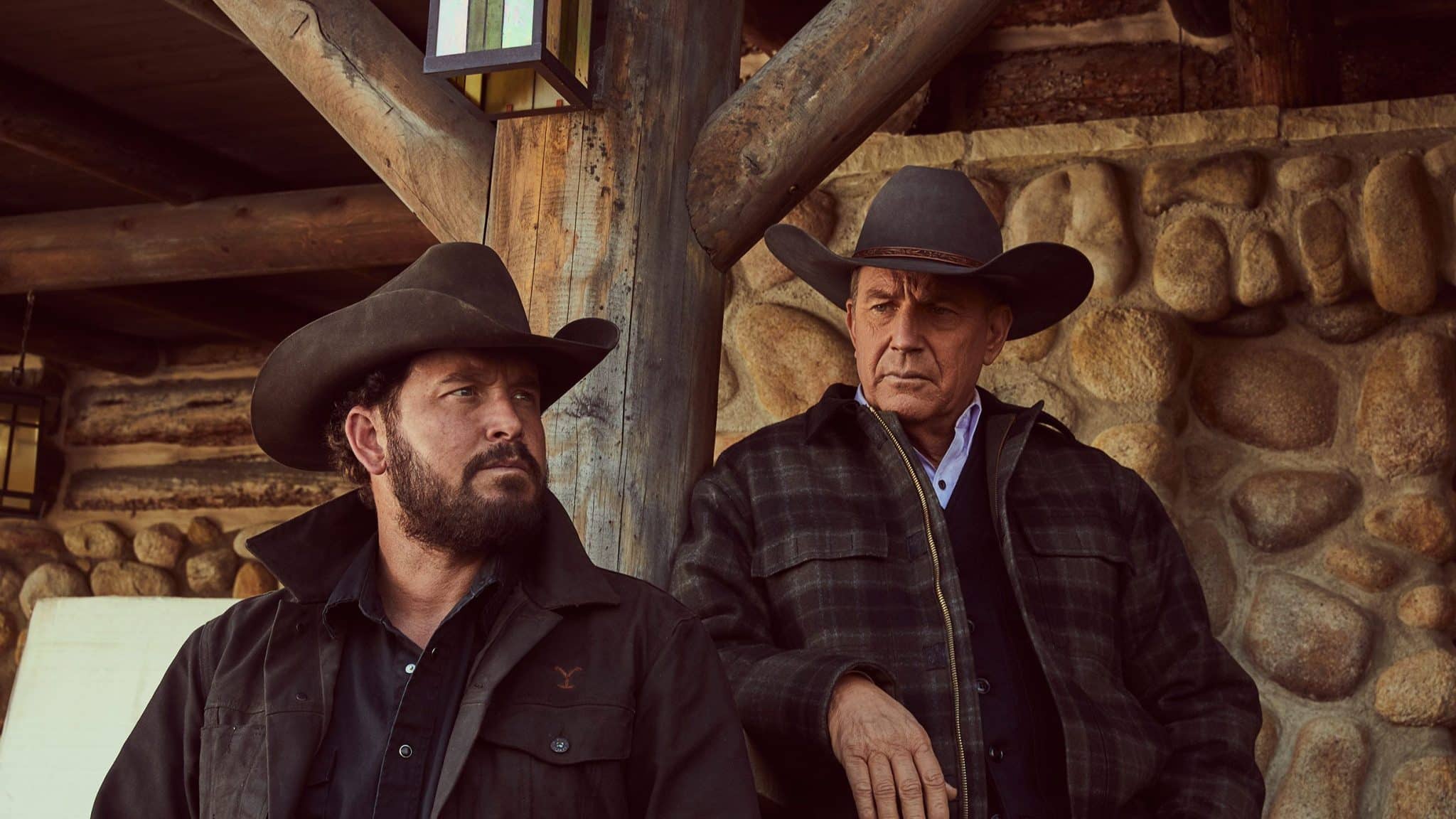 2 cast members from YELLOWSTONE dressed as cowboys