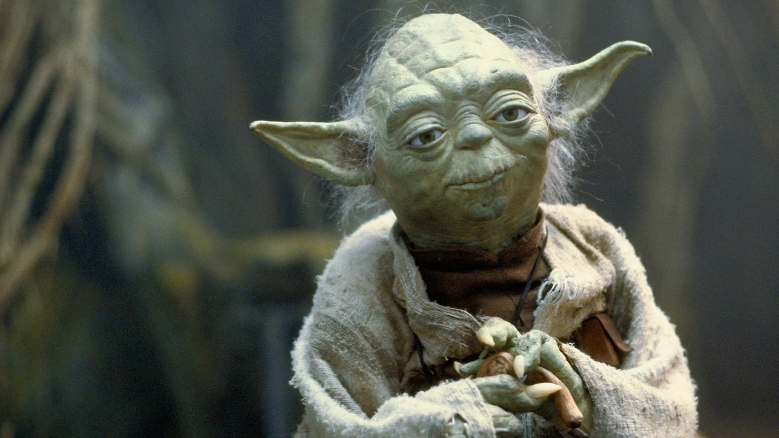 a picture of an old green YODA from Star Wars